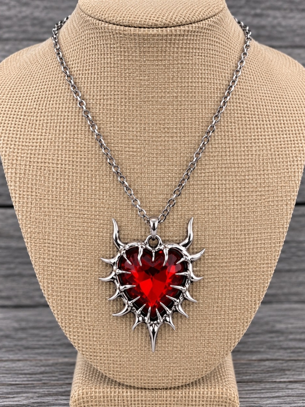 Silver Spike Heart Necklace with Red Crystal Pendant